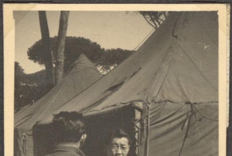 Two men standing outside tent (ddr-densho-466-35)