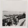 Group standing at overlook with Oakland Bay Bridge in background (ddr-densho-426-954)