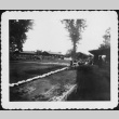Group of spectators watching a parade (ddr-densho-434-388)