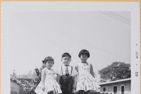 Susan and Leslie Shiomi with a boy (ddr-densho-522-574)