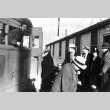 Japanese Americans boarding a bus (ddr-densho-37-117)