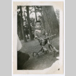 Photo of a child on a tricycle (ddr-densho-483-740)