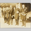 Naval commanders in formal dress with other men (ddr-njpa-13-348)