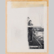 Overexposed photo of two or three people (ddr-densho-483-454)