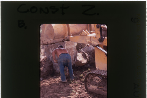 A man working on rock garden construction (ddr-densho-377-910)