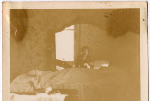 Woman reflected in mirror (ddr-densho-423-556)