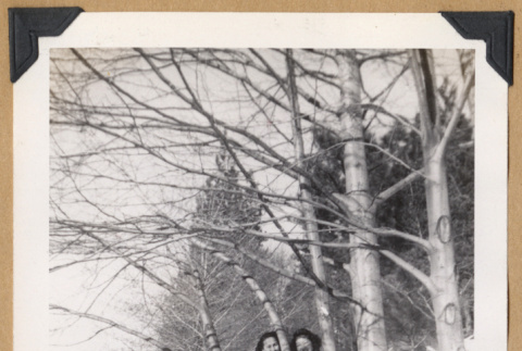 Two women posing in the snow (ddr-densho-542-327)