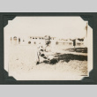 Man crouching (ddr-densho-545-43)