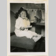 Suzanne holding a letter (ddr-densho-37-1200)