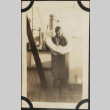 Tomoye (Nozawa) Takahashi with life ring from Ship Yokohama (ddr-densho-423-509)