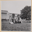 Two boys sitting on lawn (ddr-densho-522-261)