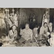 Urban E. Wild, Walter F. Dillingham and others seated at a luau (ddr-njpa-2-1064)