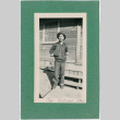 Man in fatigues standing outside barracks.  Inscription on front:  Joe- Fort Ord 1941 (ddr-ajah-2-7)
