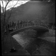 Group of people standing on small bridge (ddr-densho-426-291)