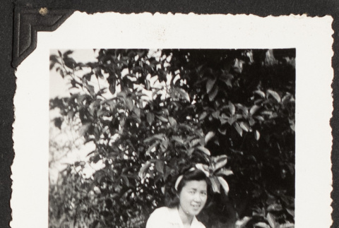 Mits holding two pigeons (ddr-densho-542-368)