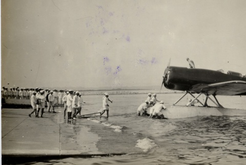 The Lindbergh's plane at dock (ddr-njpa-1-1182)