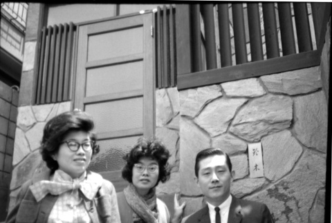 Martha (Nozawa) Tsuchida Suzuki and Tomoye (Nozawa) Takahashi with unidentified man (ddr-densho-426-2308)