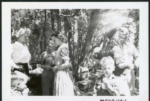 Photograph of a group of people at a Manzanar hospital staff picnic (ddr-csujad-47-305)