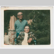 Man standing and woman in wheelchair (ddr-densho-501-20)