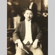 Man seated in a chair (ddr-njpa-4-2072)