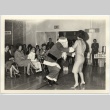 Santa dancing with an adult (ddr-jamsj-1-569)