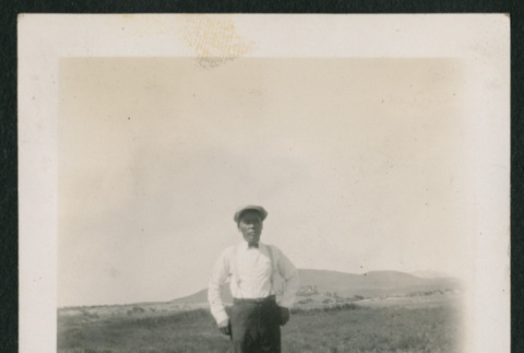 Man posing outside (ddr-densho-378-406)