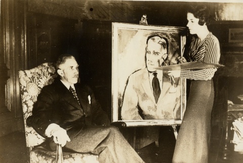 An artist painting a man's portrait (ddr-njpa-1-2362)