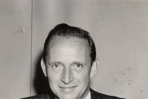 Man posing at his desk (ddr-njpa-2-965)