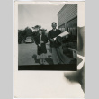 Two people outside an office (ddr-densho-329-805)