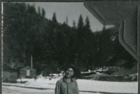 Joe Iwataki standing in snow (ddr-ajah-2-292)