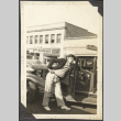 Man leaning on car (ddr-densho-326-594)