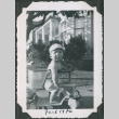 Photo of a baby in a baby walker (ddr-densho-483-1316)
