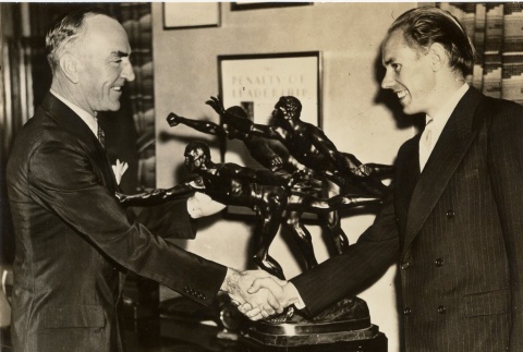 Two men shaking hands (ddr-njpa-1-1419)