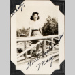 Woman sitting on railing (ddr-densho-587-54)