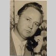 Man holding a telephone (ddr-njpa-2-946)