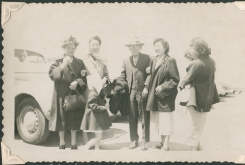 Welcoming family at the airport (ddr-densho-321-1042)
