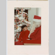 Photo folder with photo of girl with Santa (ddr-densho-430-317)