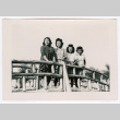 Four women on footbridge (ddr-densho-475-207)