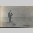 Gentaro Takahashi standing on shore (ddr-densho-355-600)
