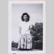 Young woman in flower print skirt (ddr-densho-464-112)