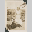 Man and woman with dog (ddr-densho-316-242)