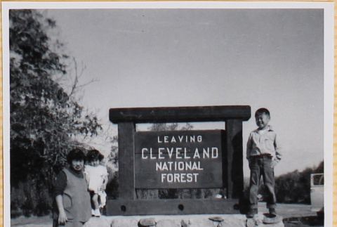 Yoshiko, Susan and William Shiomi by Cleveland National Forest sign (ddr-densho-522-304)