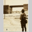Soldiers standing near a bridge (ddr-njpa-6-123)