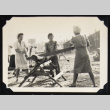 Women sawing firewood (ddr-densho-542-654)