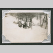Four people in snow (ddr-densho-550-154)