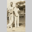 Two tennis players on the court (ddr-njpa-1-2297)