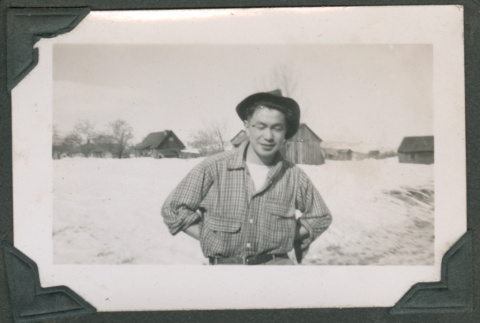 Man in a snowy field (ddr-densho-463-190)