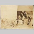 People standing on pier with streamers (ddr-densho-423-530)