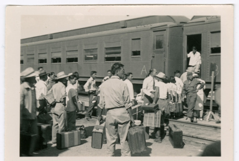 Crowd boarding a train (ddr-densho-475-394)