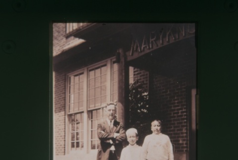 (Slide) - Image of man and two boys outside Maryknoll (ddr-densho-330-61-master-38a412f7e4)